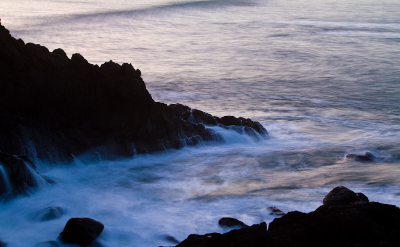 Waves Washing Rocks At Dawn